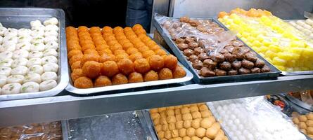 a-variety-of-delicious-indian-sweets-free-photo